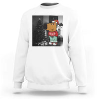 White crewneck sweatshirt with Christmas character graphic on front