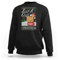 Christmas meme sweatshirt, black with cartoon Santa face and “CHRISTMAS” graphic