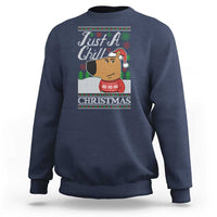Christmas meme sweatshirt, navy blue with cartoon Santa face and “CHRISTMAS” graphic