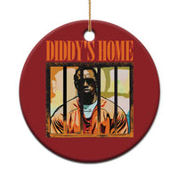 Red round Christmas ornament with gold hanging loop and DIDDY'S HOME graphic