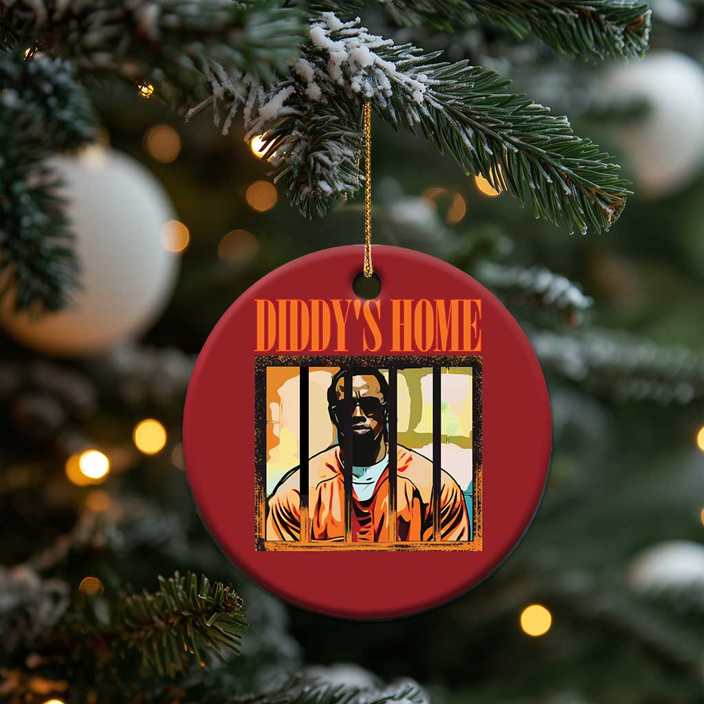 Red round Christmas ornament with gold hanging loop and DIDDY'S HOME graphic front view