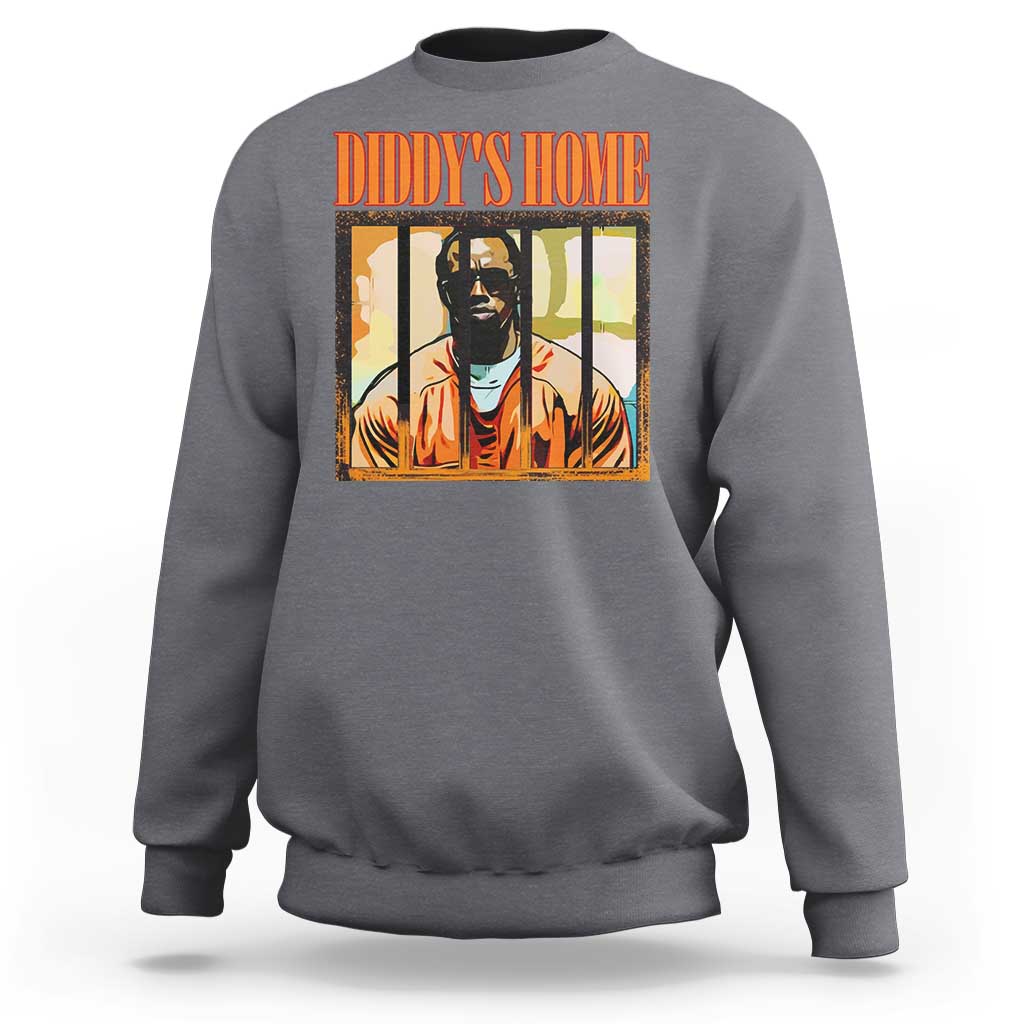 Charcoal gray crewneck sweatshirt with “DIDDY’S HOME” graphic and portrait print on chest.