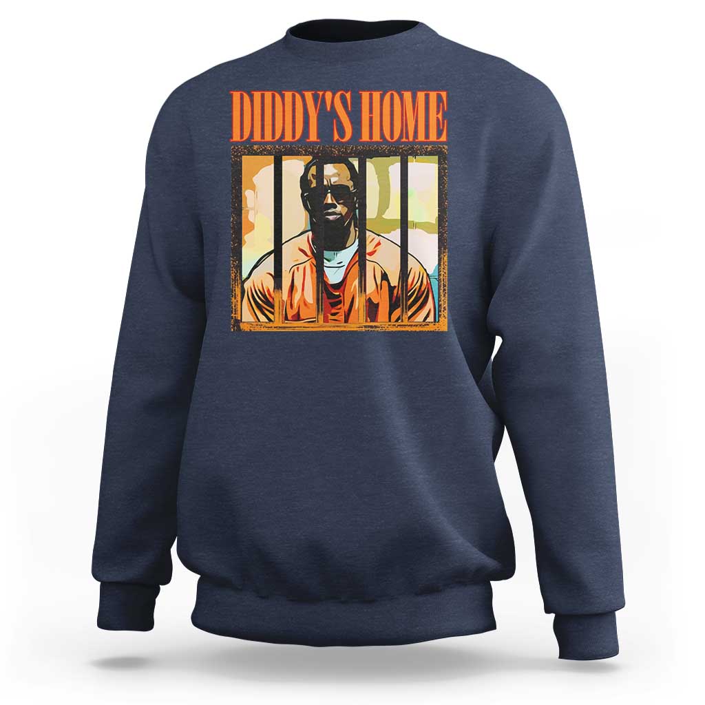Navy crewneck sweatshirt with “DIDDY’S HOME” graphic and portrait print on chest.