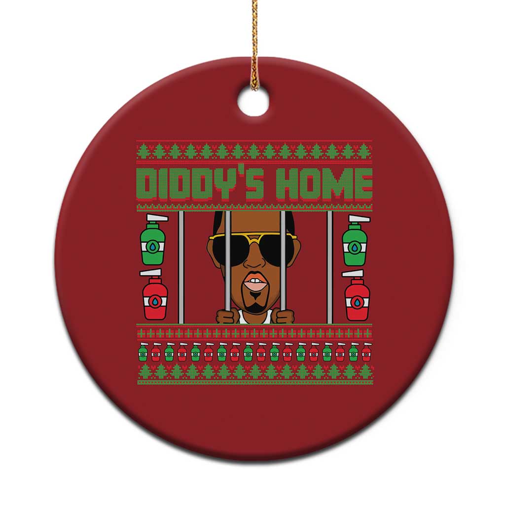 Red circular Christmas ornament with 'DIDDY'S HOME' front graphic, hanging gold string.