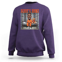 Purple crewneck sweatshirt with DIDDY'S HOME back graphic