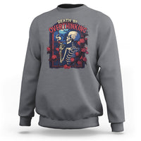 Charcoal gray crewneck sweatshirt with skeleton smoking graphic on front