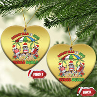 Gold heart-shaped Christmas ornament with Nurse Squad graphic and hanging gold cord.