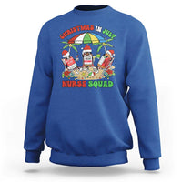 Royal blue crewneck sweatshirt with colorful Nurse Squad holiday graphic on front