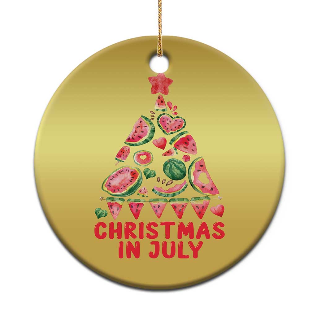 Round gold Christmas ornament with watermelon tree graphic and “Christmas in July” text