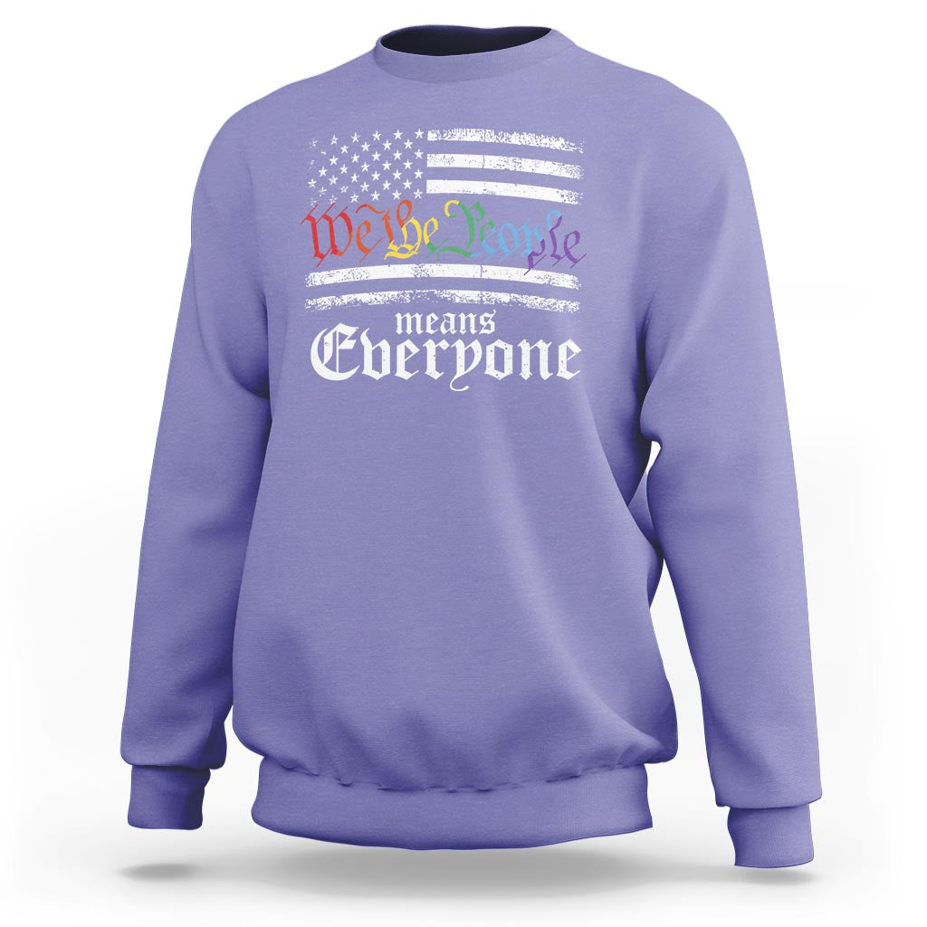 Purple crewneck sweatshirt with 'We the People means everyone' patriotic graphic