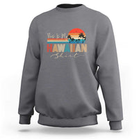 Charcoal gray crewneck sweatshirt with long sleeves and 'Hawaiian' beach graphic
