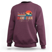 Maroon crewneck sweatshirt with long sleeves and 'Hawaiian' beach graphic print