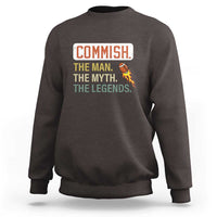Charcoal crewneck sweatshirt with Commish graphic text