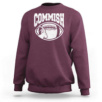 Maroon crewneck sweatshirt with 'COMMISH' football and goat graphic on front