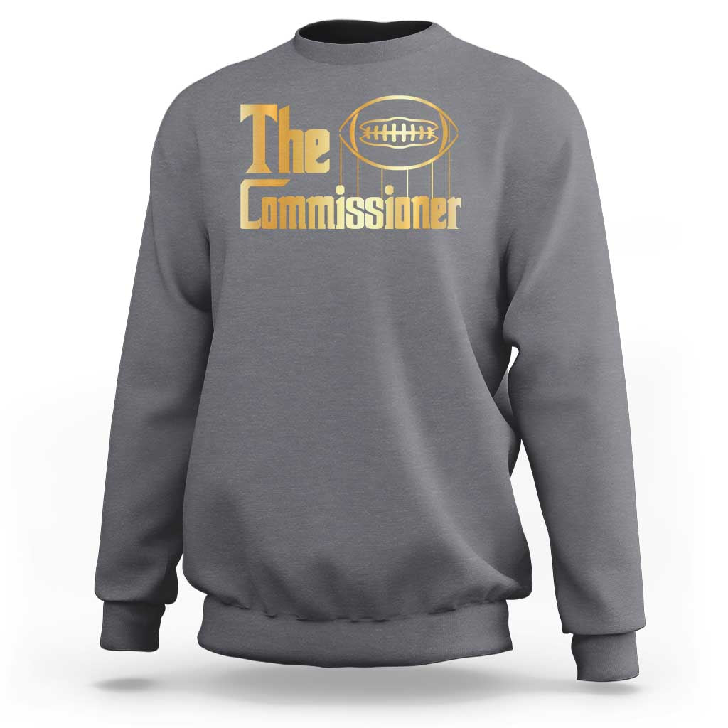 Charcoal gray crewneck sweatshirt with 'The Commissioner' football graphic.