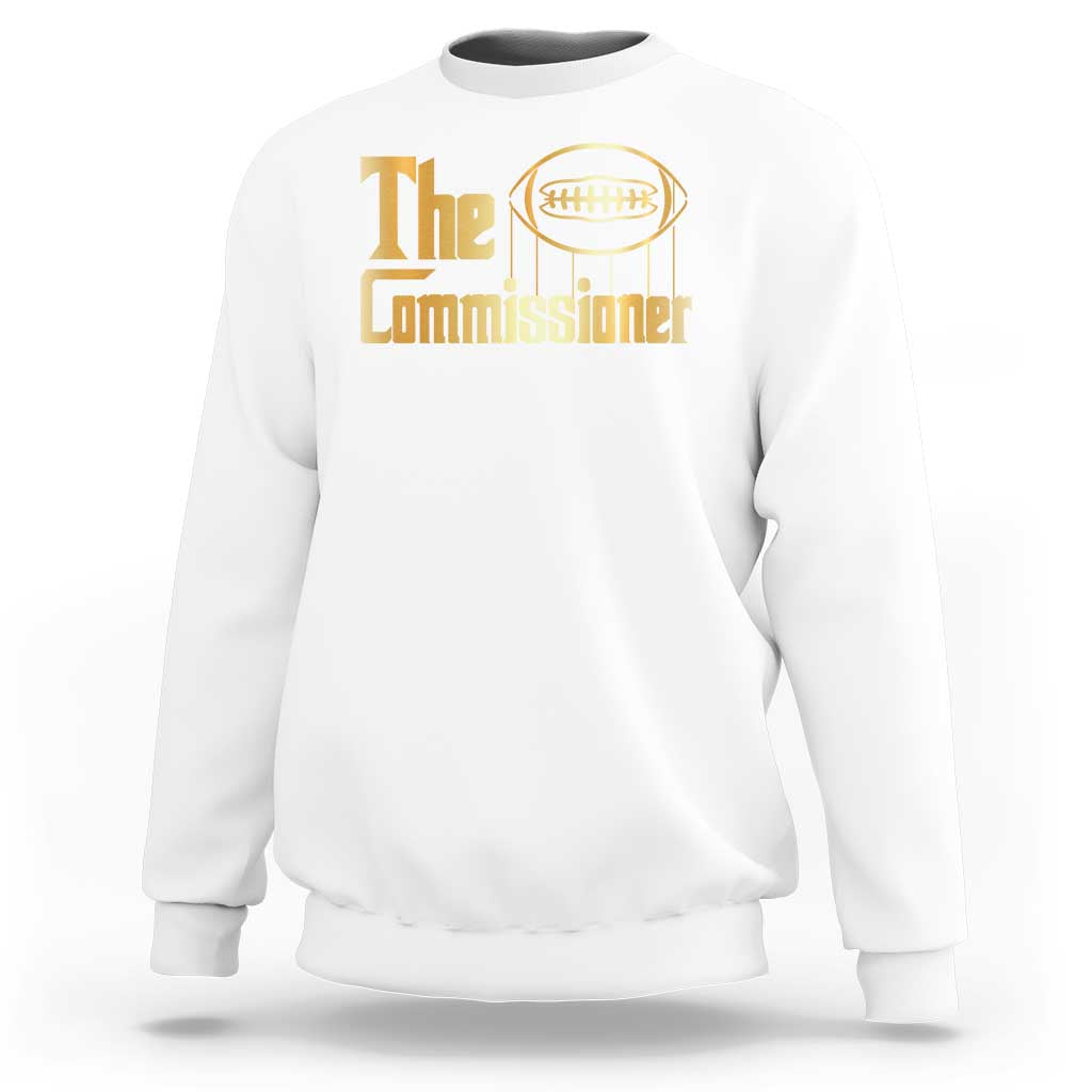 White crewneck sweatshirt with 'The Commissioner' football graphic.