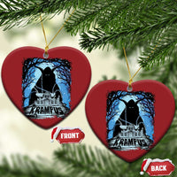 Two red heart-shaped Krampus ornaments with blue haunted house graphic and gold loops