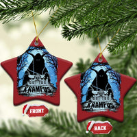 Two red star-shaped Krampus ornaments with blue haunted house graphic and gold hanging loops