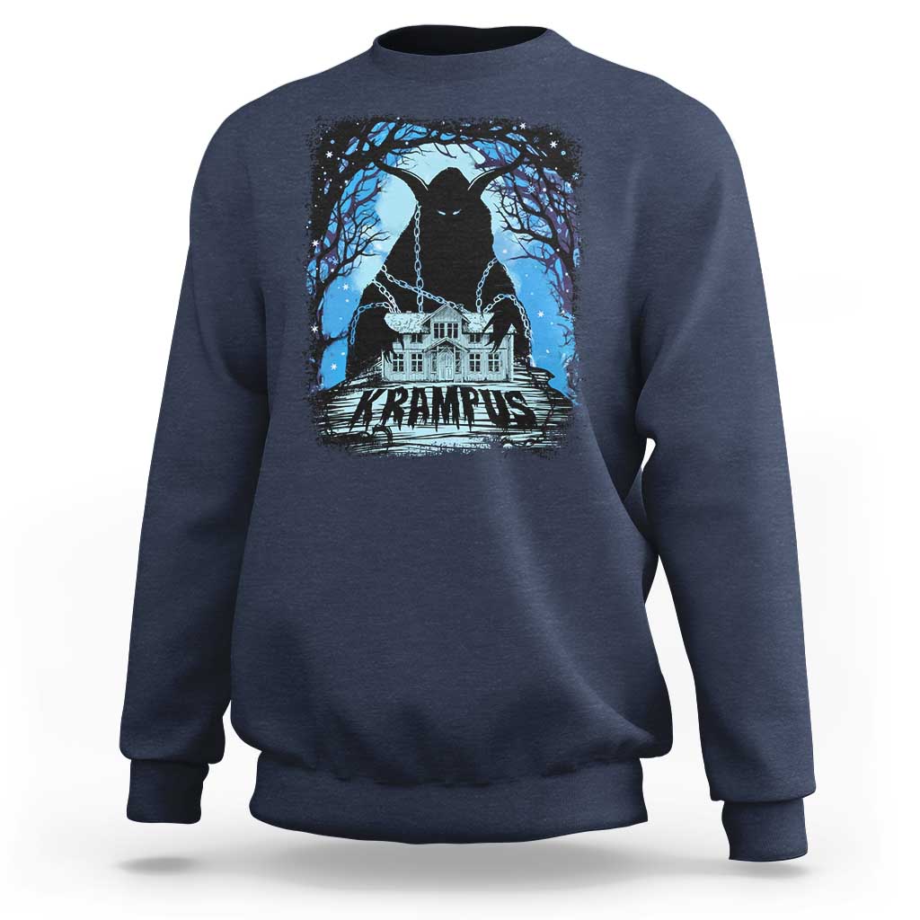 Navy crewneck sweatshirt with Krampus night house graphic and blue trees print on chest.