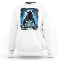 White crewneck sweatshirt with Krampus night house graphic and blue trees on chest.