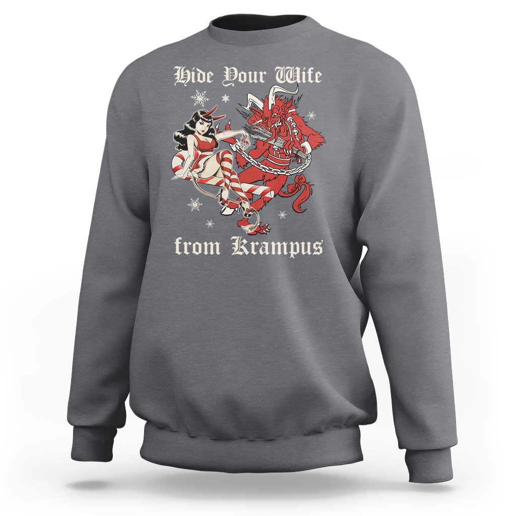 Charcoal crewneck Christmas sweatshirt with red Krampus graphic and text 'Hide Your Wife'