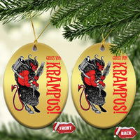 Gold oval Krampus ornaments with red lettering and devil figure; two hanging pieces