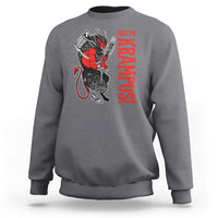 Charcoal gray crewneck sweatshirt with red-and-black Krampus graphic and vertical text
