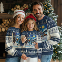 Dark blue ugly Christmas sweater with snowy night scene graphic and winter motif knit pattern