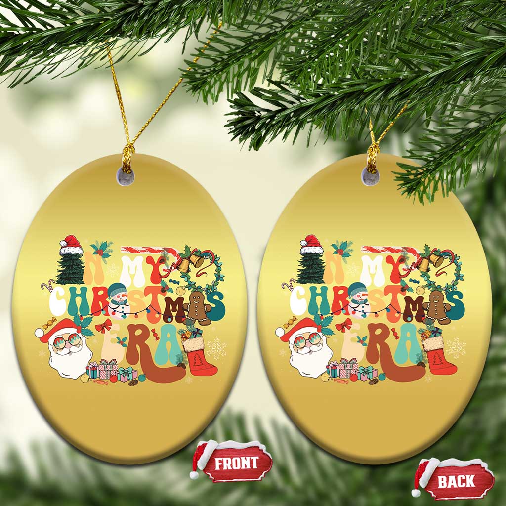 Gold oval Christmas ornament pair with retro 'Christmas' graphic, front and back tags
