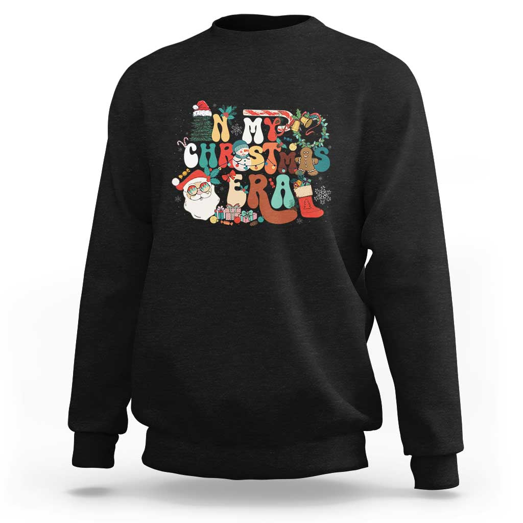 Black crewneck sweatshirt with colorful retro Christmas graphic on chest