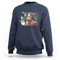 Navy crewneck sweatshirt with colorful retro Christmas graphic on chest