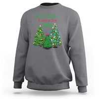 Charcoal gray Christmas sweatshirt with “Our First Christmas As A Family of Three 2024” graphic