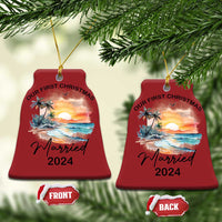 Pair of red bell-shaped Christmas ornaments with “Our First Christmas” and “Married 2024”