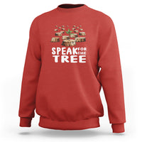 Red sweatshirt with Speak for the Tree graphic and tree stump illustration