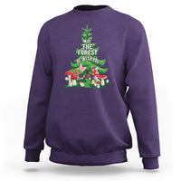 Purple crewneck sweatshirt with forest-themed graphic on front