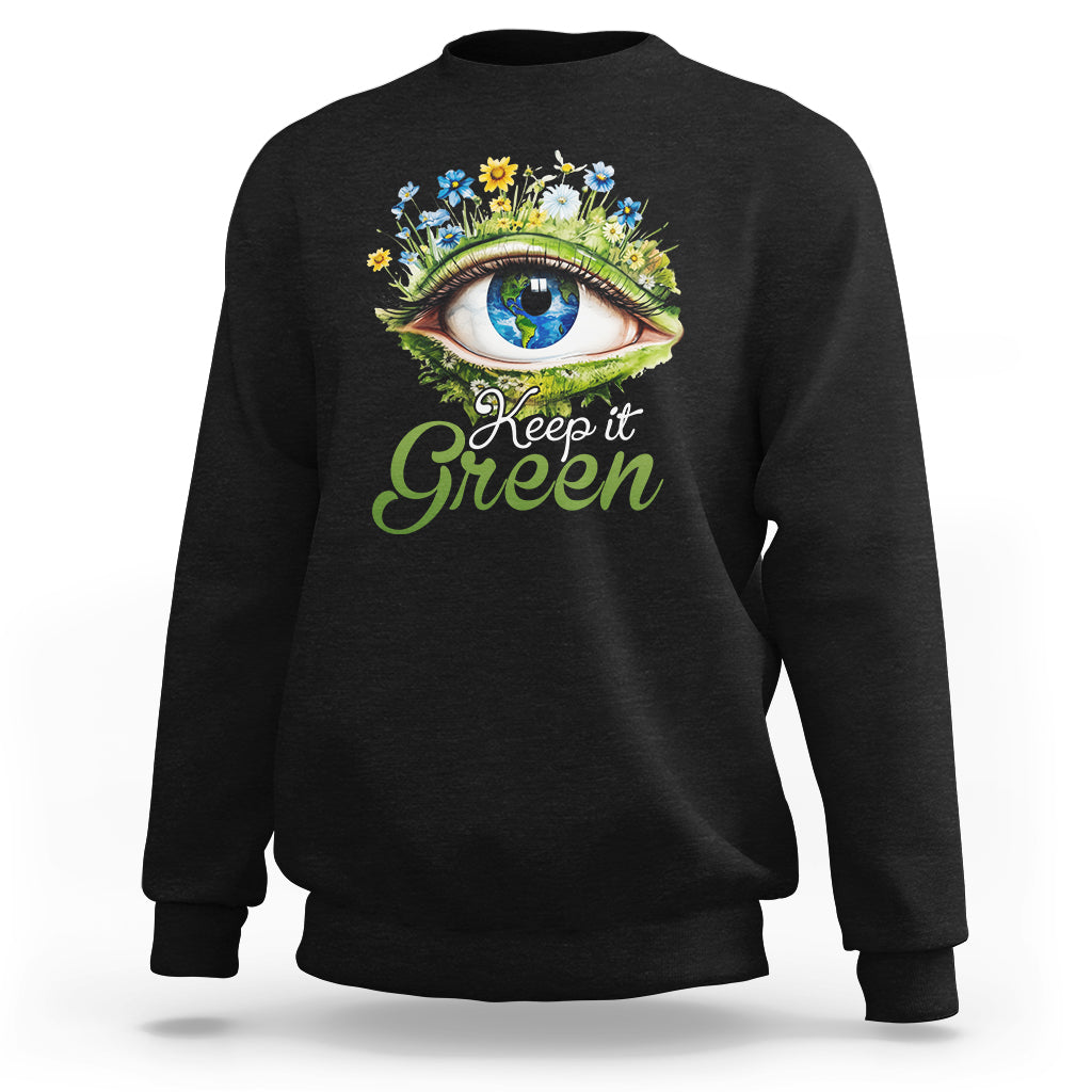 Black crewneck sweatshirt with “Keep it Green” eye graphic on the front.