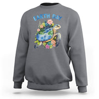 Charcoal Earth Day sweatshirt with sea turtle graphic and flowers on the chest