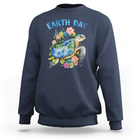 Navy Earth Day sweatshirt with sea turtle graphic and flowers on the chest
