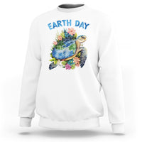 White Earth Day sweatshirt with sea turtle graphic and flowers on the chest