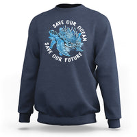 Dark blue sweatshirt with blue sea turtle graphic and “Save Our Future” text