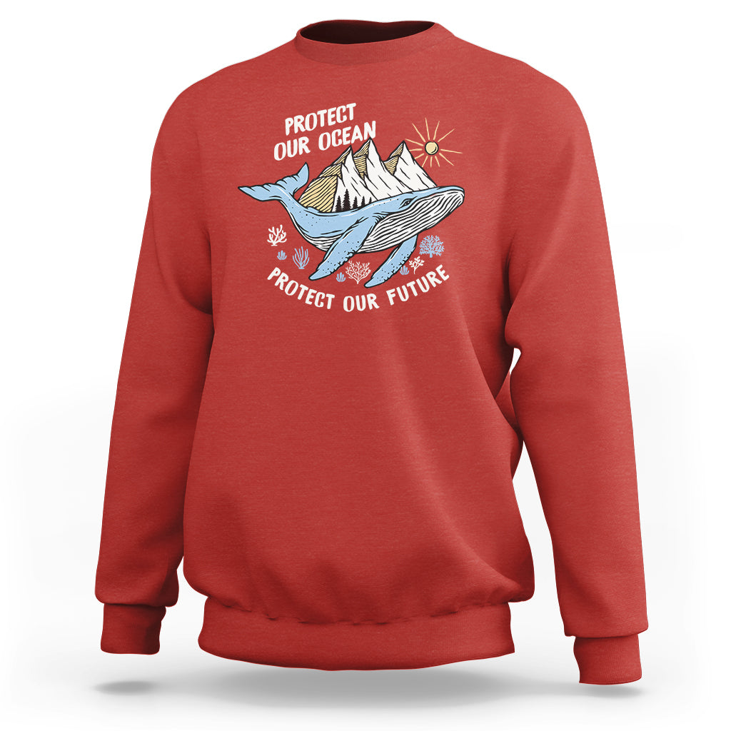 Red sweatshirt with whale graphic and text “Protect Our Ocean, Protect Our Future”