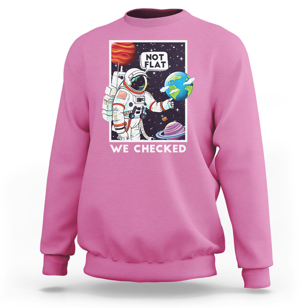 Pink sweatshirt with astronaut and “NOT FLAT” space graphic, pullover crew neck