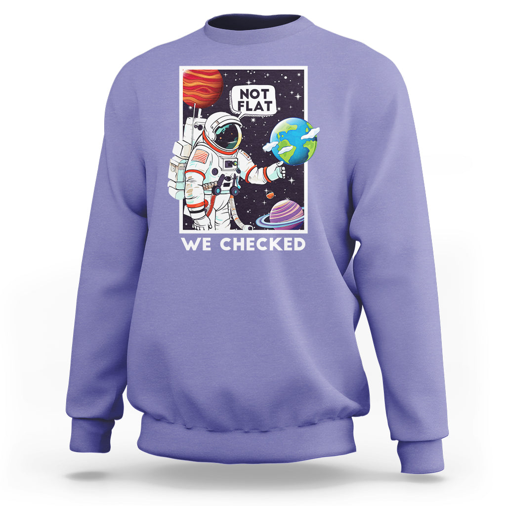 Lavender sweatshirt with astronaut and “NOT FLAT” space graphic, pullover crew neck