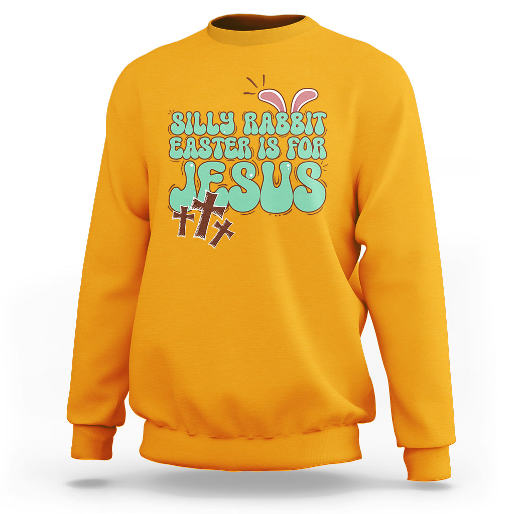 Gold crewneck sweatshirt with colorful Easter rabbit "Easter is for Jesus" graphic.