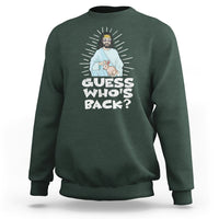 Dark forest green crewneck sweatshirt with “Guess who’s back?” graphic featuring Jesus and bunny