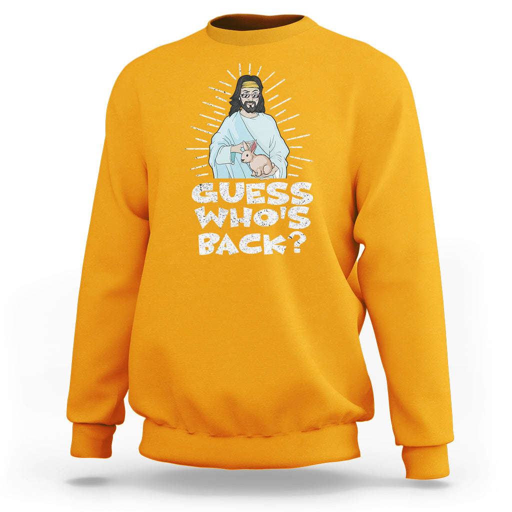Gold crewneck sweatshirt with “Guess who’s back?” graphic featuring Jesus and bunny