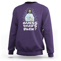 Purple crewneck sweatshirt with “Guess who’s back?” graphic featuring Jesus and bunny