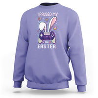 Violet crewneck gamer sweatshirt with “I paused my game for Easter” text and controller graphic