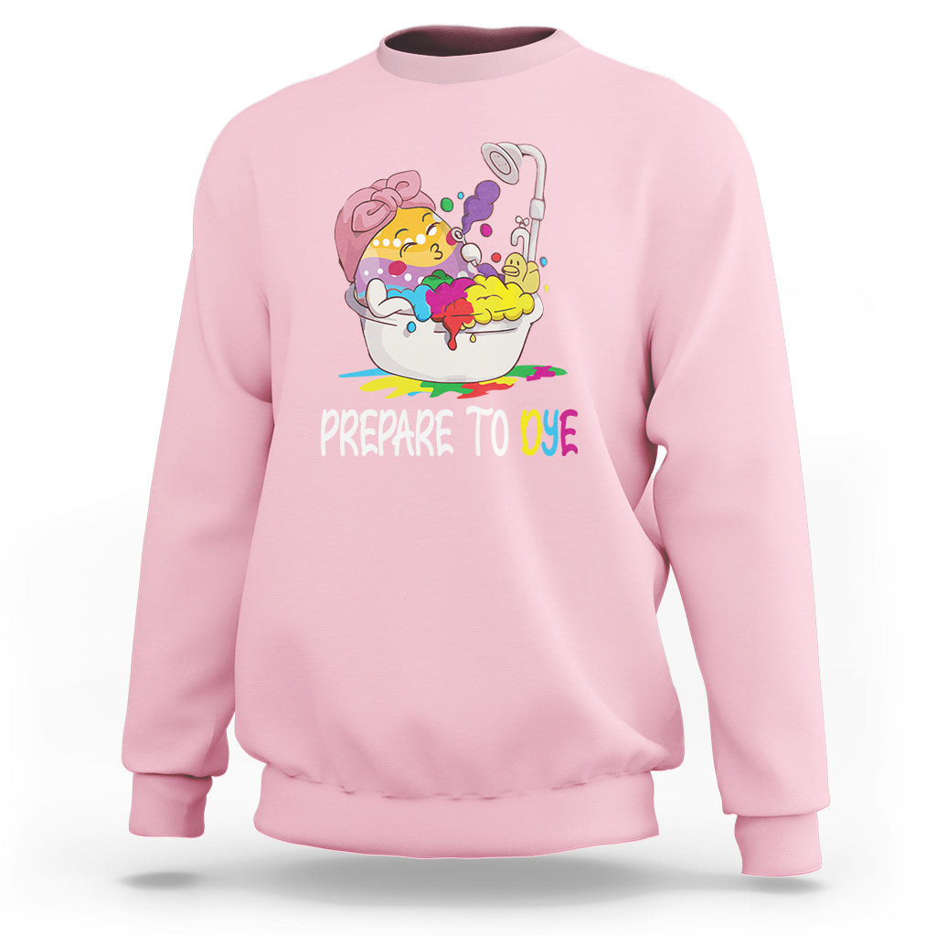 Light pink Easter sweatshirt with 'Prepare to Dye' and colorful egg artwork