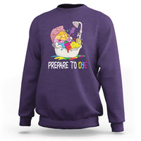 Dark purple Easter sweatshirt with 'Prepare to Dye' text and egg-dye illustration